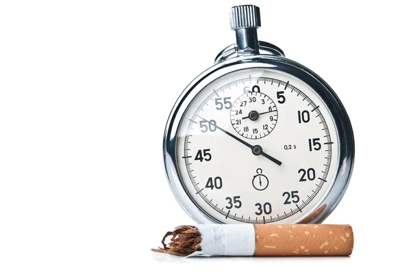 Colilla de cigarrillo y cronómetro — Foto de Stock