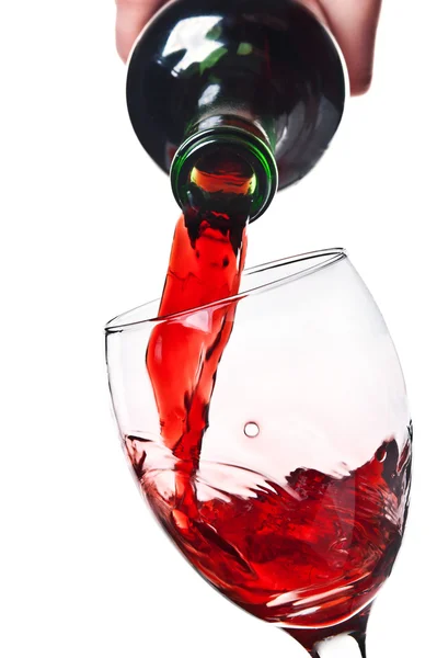 Kobiety zalewanie kieliszek czerwonego wina — Zdjęcie stockowe