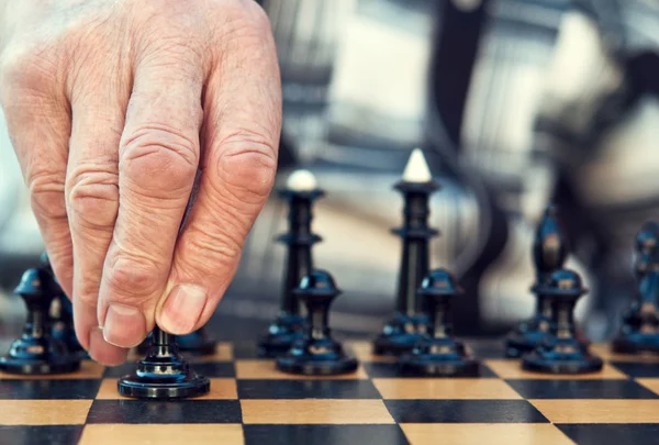 stock image Old man playing chess