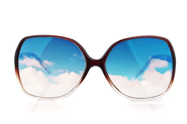 Sun-glasses with the reflections of the sky — Stock Photo, Image