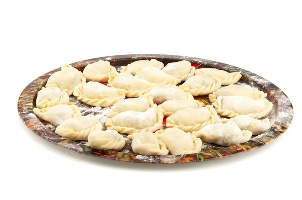 Raw dumplings on a tray — Stock Photo, Image