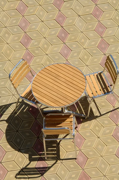 Table and chair on the street — Stock Photo, Image