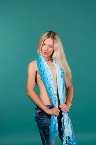 Portrait of sexy girls blonde in jeans and a scarf — Stock Photo, Image