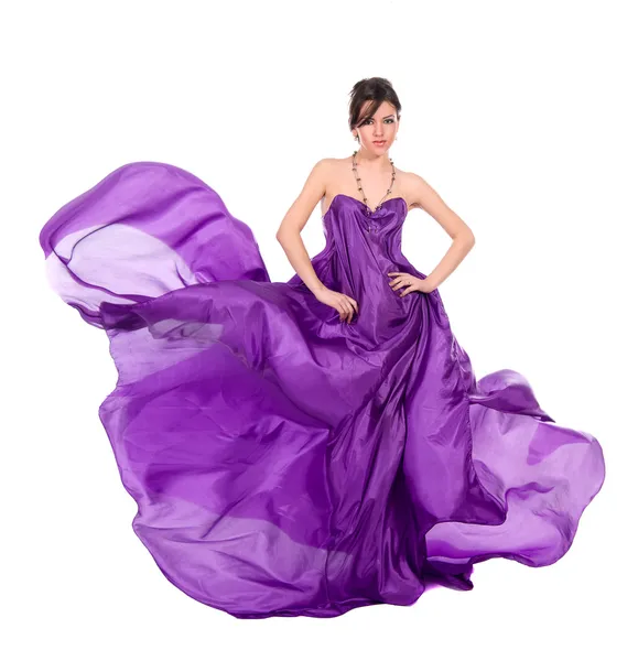 Dívka v létání purpurové hedvábné šaty — Stock fotografie