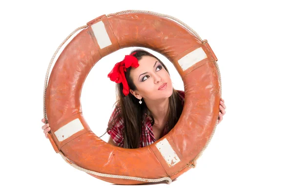 Kız PIN tarzında bir lifebuoy ile — Stok fotoğraf