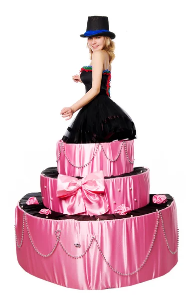 Girl, a surprise gift, jumps out of the toy cake — Stock Photo, Image