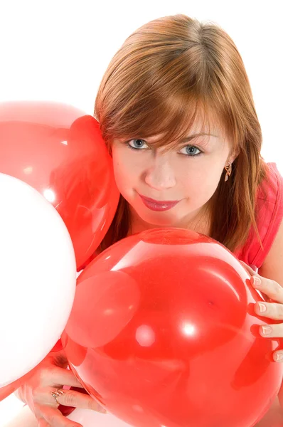红头发的女孩在气球的粉红色连衣裙 — 图库照片