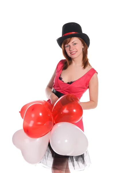 Červené vlasy dívka v růžových šatech a válec klobouku — Stock fotografie