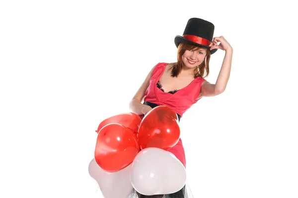 Kırmızı saçlı kız pembe elbise ve silindir şapkalı — Stok fotoğraf