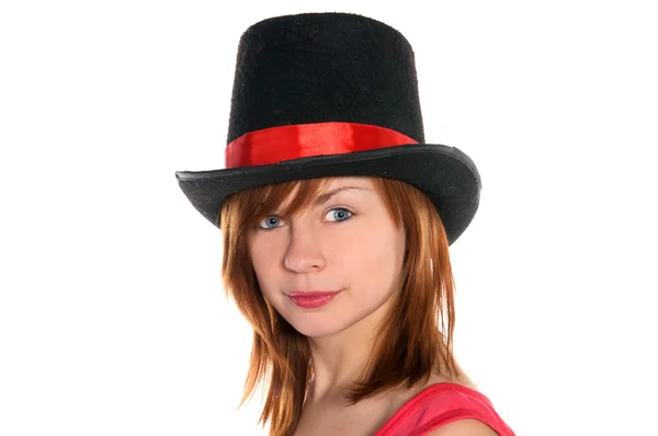 Červené vlasy dívka v růžových šatech a válec klobouku — Stock fotografie