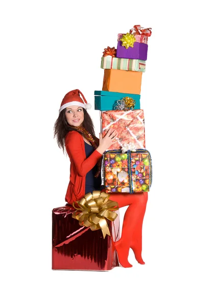 Güzel bir kız bir sürü hediye kutuları tutarak — Stok fotoğraf