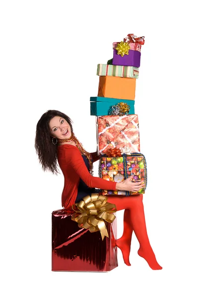 Piękna dziewczyna trzyma dużo budek z darów — Zdjęcie stockowe