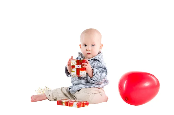 Niño niño jugado regalos festivos —  Fotos de Stock