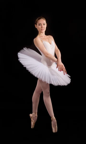 Klassieke ballerina in een witte rok — Stockfoto