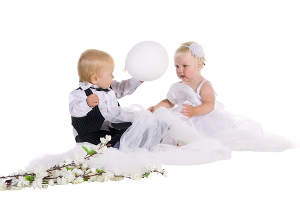 Boy and girl dressed as a bride and groom — Stock Photo, Image