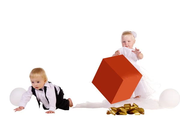 stock image Boy and girl with a big box in hands