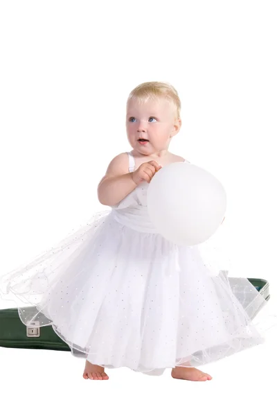 Girl in holiday dress with balloon — Stock Photo, Image