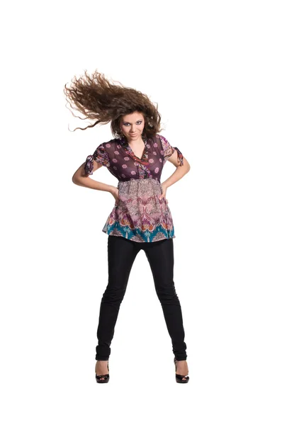 Girl with curly hair in motion — Stock Photo, Image