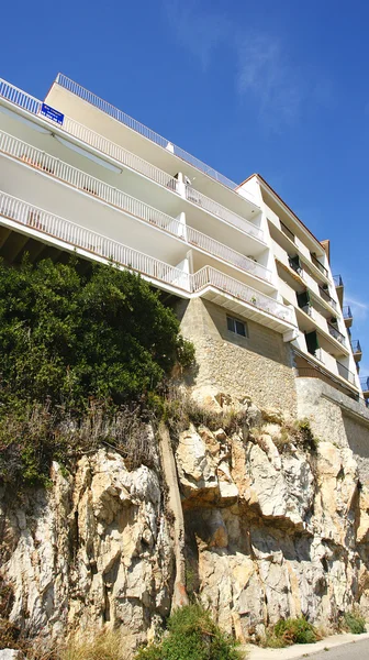 Block of flats on a rock — Stock Photo, Image