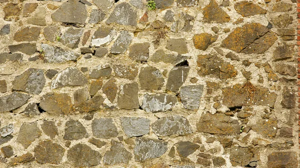 Muur van steen voor achtergronden en texturen — Stockfoto