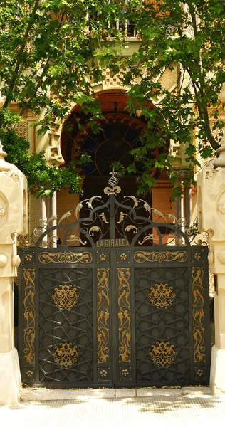 Door of entry to La Giralda of El Arbós — стокове фото