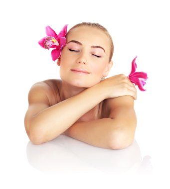 Beautiful woman in spa salon clipart