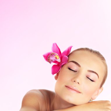 Young woman at spa salon clipart