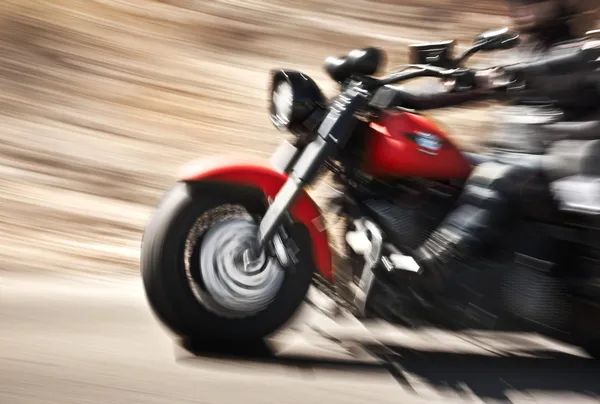 Abstracte slow motion, biker rijden motorfiets — Stockfoto