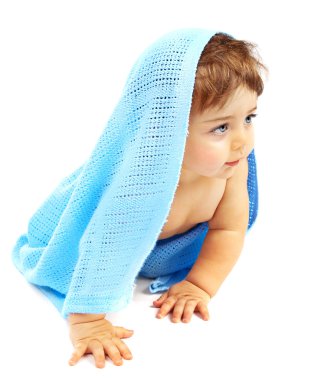 Sweet little baby boy covered blue towel clipart