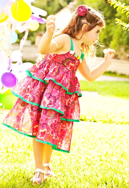 Nice small girl dancing outdoors — Stock Photo, Image