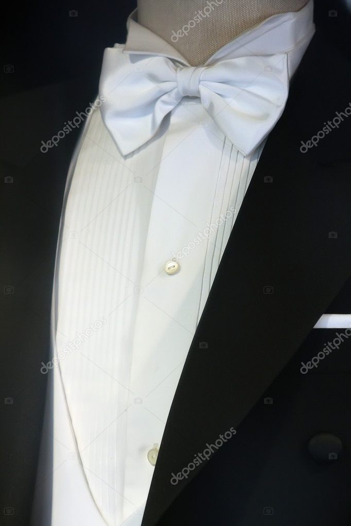 Elegant tuxedo with a nice white tie