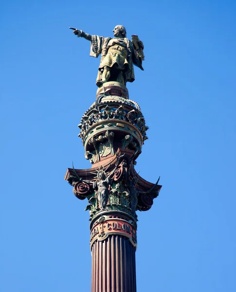 Barcelona cristobal colon socha na modré obloze — Stock fotografie