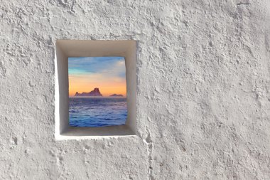 Balearic islands Es Vedra sunset through window clipart