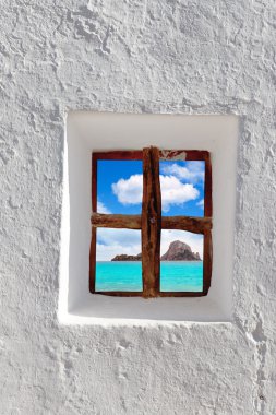 Ibiza Es vedra island view through white window clipart