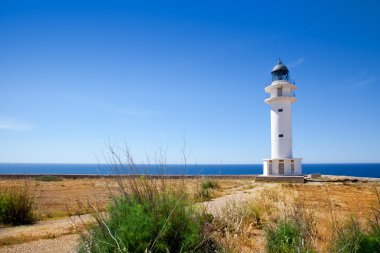 Barbaria Cape lighthouse in Formentera island clipart