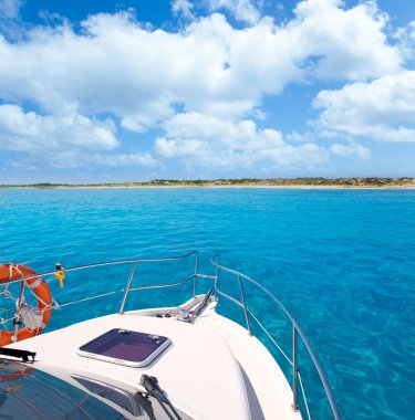 Boat in Formentera island on llevant beach clipart