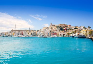 Eivissa Ibiza town with church under blue sky clipart