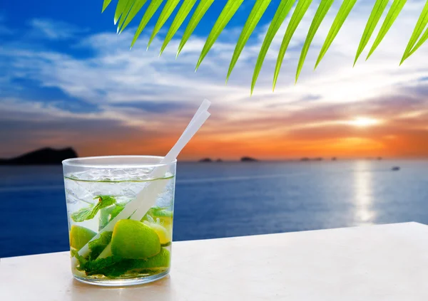 Ibiza cala Conta Conmte sunset with Mojito drink — Stock Photo, Image