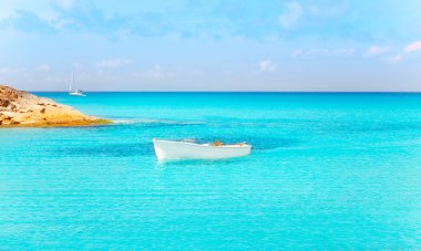 Es Calo de San Agusti with boat in Formentera clipart