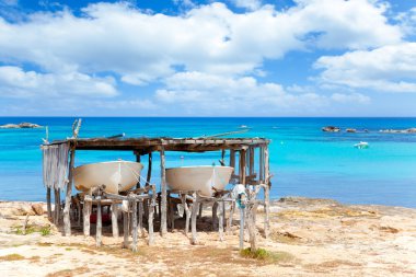 Beached boats in Formentera Els Pujols beach clipart