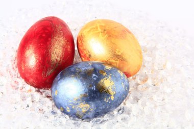 Three colored Easter eggs clipart