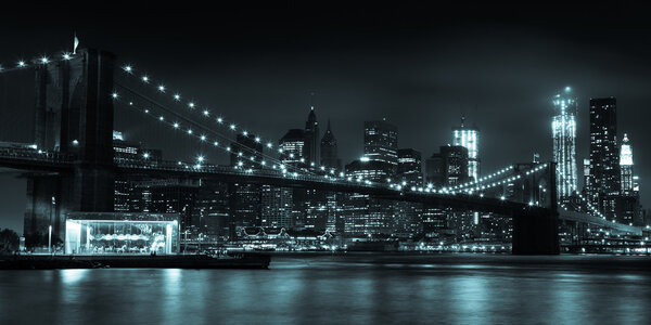 Manhattan skyline by night from Brooklyn bridge park