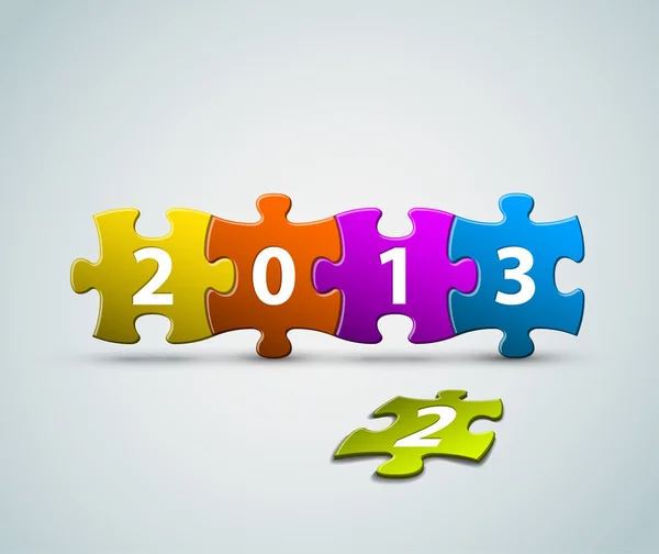 Nuovo anno 2013 carta fatta da pezzi di puzzle colorati — Vettoriale Stock