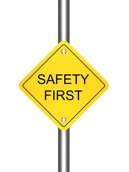 stock image Safety first yellow road sign on white background