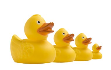 Yellow toy duckling on white clipart