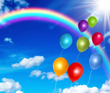 Colorful balloons on the blue sky background clipart