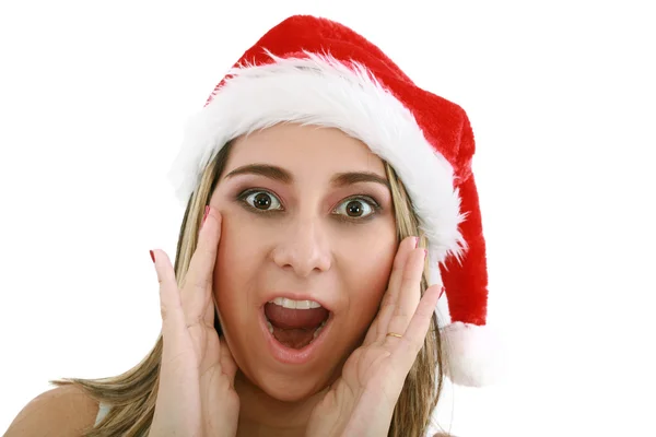 Vrouw in Kerstman hoed verbaasd voor Kerstmis. — Stockfoto