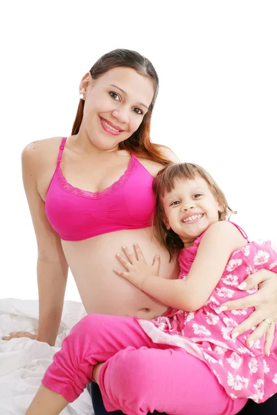 Hermosa mujer embarazada con su hija —  Fotos de Stock