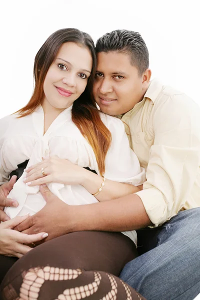 Happy pregnant couple expecting their baby over white — Stock Photo, Image