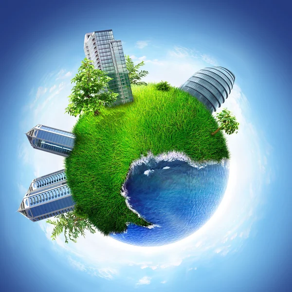 Buildings on green planet and ocean. Concept of business world. — Stok fotoğraf